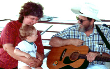 Gloria, John, Vern with guitar