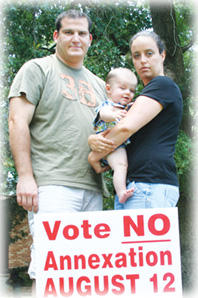 Yearby family with no annexation yard sign